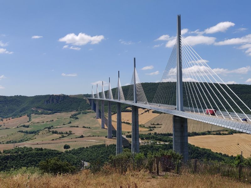 You really should see the Millau Viaduct if you go that way. The special rest area has all conveniences.