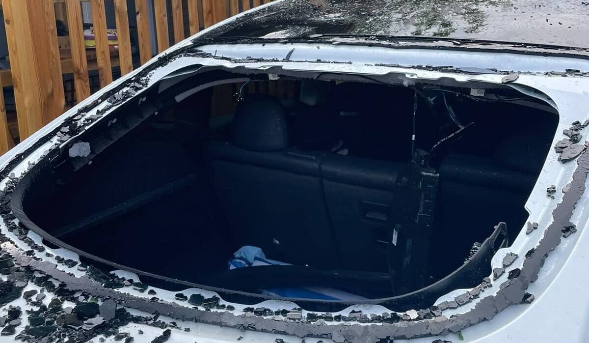 a car with a bursted windshield